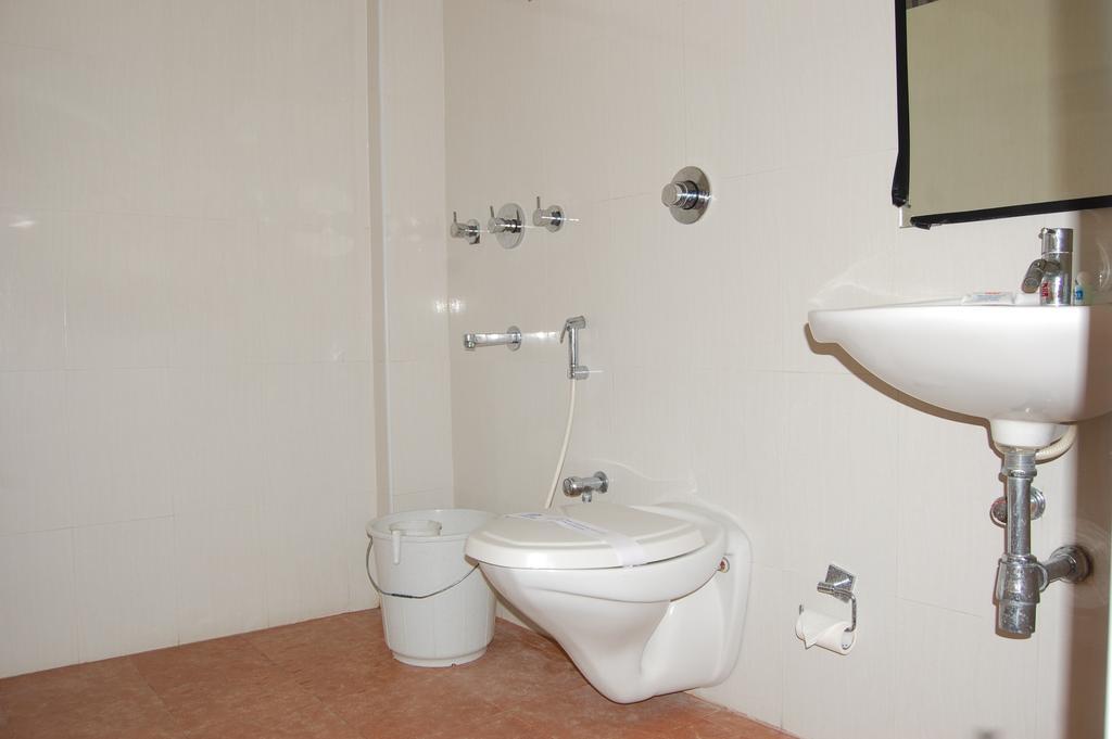 Hotel Orange Blossom Tiruchirappalli Quarto foto